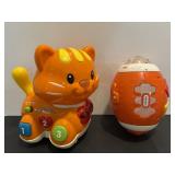 V Tech catch-me-kitty & Little Tikes activity...