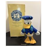 Vtg Musical porcelain Donald Duck with box & key..