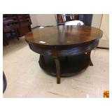Bassett Dark Wood Round Table with a Lower Shelf, approximately 38" diameter