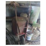 Wheelbarrow, Log Chain and Galvanized Trash Can