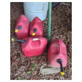 4 Red Plastic Gas Cans