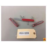 Group of Three Red Multi-Tool Pocket Knives