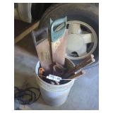 Bucket of Hand Saws and Wooden Handles