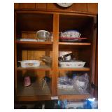 Contents of Cabinet: Measuring Cup, Casserole Dishes & More