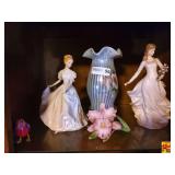 Contents of Shelf in Entertainment Center: Figurines & Vase