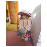 Porcelain Doll on Stand