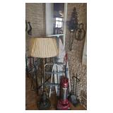 Stand Up Lamp, Ironing Board, Vacuum, Walker, and Wall Decor