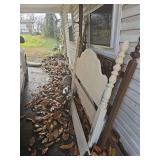 Contents under Carport (car not included) Headboards, Glass table, and Cushions
