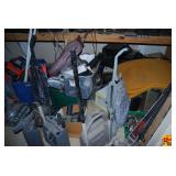 Collection of Vintage Vacuum Cleaners and Electronics