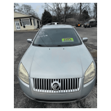 2006 Mercury Milan; 120533 Miles; VIN 3MEHM07Z56R657380; Rebuilt Salvage Title.  Currently not on property.  Call James Treece at (256) 374-2035.