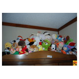Stuffed Animals on Top of Wardrobe