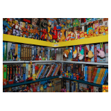 Contents on Top Shelf of Closet: VHS Tapes, Disney & Marvel Characters