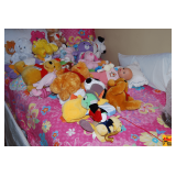 Stuffed Animals on the Bed