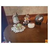 Items on Table: Dancing Couple Figurine, Jesus with Children Figurine & More