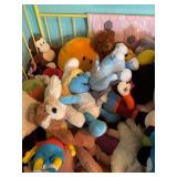 Contents of the Baby Crib: Stuffed Animals & More