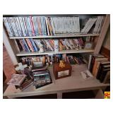 Contents of Bottom 3 Shelves & Items on Cabinet: Assorted VHS & DVD