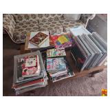 Contents on Coffee Table: Magazines, Books, LP