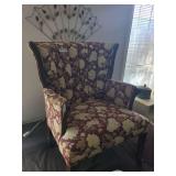 Upholstered Wingback Chair with Floral Pattern