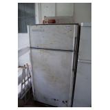 Frigidaire Top-Mount Refrigerator with Assorted Contents