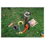 Garden Tool Assortment Including Sprayer, Sprinkler, and Pump