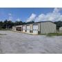 PRIME COMMERCIAL LOCATION:  2 Buildings For 1 Money & Caterpillar Loader