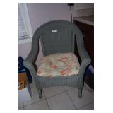 Grey Wicker Armchair with Floral Cushion