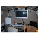 Lot of Electronics and Appliances Including Television, Mini Fridge, and Fans