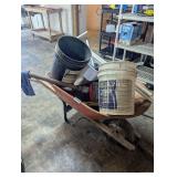 Wheelbarrow With Assorted Buckets and Hand Tools