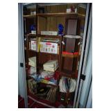 Shelf Contents Including Storage Boxes, Linens, Records, and Miscellaneous Items