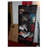 Black Laminate Bookshelf with Assorted Office Supplies and Storage Binders