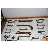 Collection of Assorted Implement and Farm Tool Wrenches Mounted on Display Board