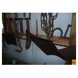 Collection of Farm Tools, Plow Parts, Wooden Spools, and Hardware