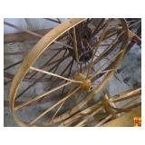 Pair of Yellow Painted Metal Implement Wheels with Hubs and Spokes