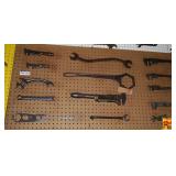 Assorted Metal Wrenches and Hand Tools on Pegboard Display Lot