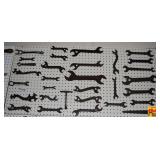 Large Collection of Assorted Metal Wrenches and Hand Tools on Pegboard Display