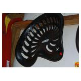 Cast Iron Tractor Seat with Slotted Design and Red Painted Accents