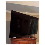 Large Flat Screen Television With ArticulatIng Wall Mount