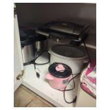 Contents Of Lower Kitchen Cabinet:  Crock Pots, Rice Cooker & Towels