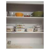 Contents Of Cabinet:  Casserole Bakeware, Mixing Bowls, Coffee Mugs & Bowls