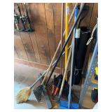 Assorted Yard and Lawn Tools Including Rakes and Brooms