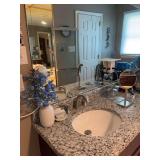 Contents Of Bathroom:  Vanity Acessories, Small Fan, Wall Sconce, Artificial Florals & Accents