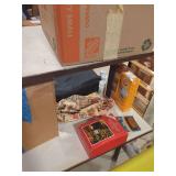 Contents of Rack With Books, Decor, and Household Items