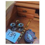 Collectibles Including Candlesticks, Flute, and Movie Camera