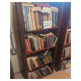 Assorted Book Lot on Bookshelf