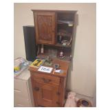 Wooden Cabinet with Hutch and Carved Door Detail
