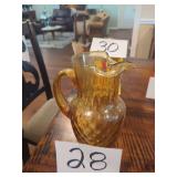 Amber Iridescent Glass Pitcher With Fluted Rim and Handle