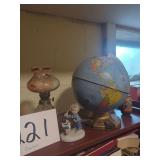 Mixed Shelf Lot Including Globe, Miniature Oil Lamp, and Figurine