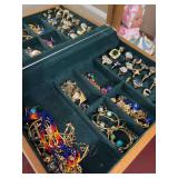 Jewelry Box Filled with Assorted Rings, Necklaces, Earrings, and Brooches