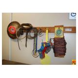 Shop Assortment with Corner Clamp, Cordage, Wire, and Hardware on Wooden Wall Rack