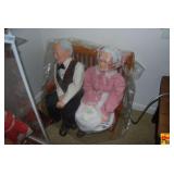 Elderly Couple Figurines Seated on Wooden Bench